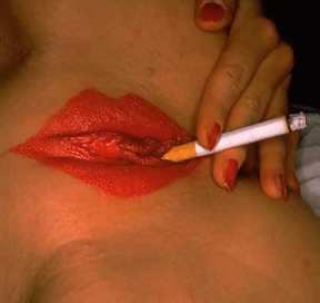 picture of a woman with lips drawn on her vagina which is smoking a fag
